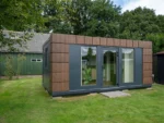 Conteneur abri de jardin 7×3 m avec toilettes et cuisine sur le côté gauche